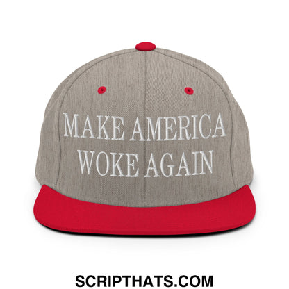 Gray snapback cap with red brim and button featuring white embroidered text make america woke again