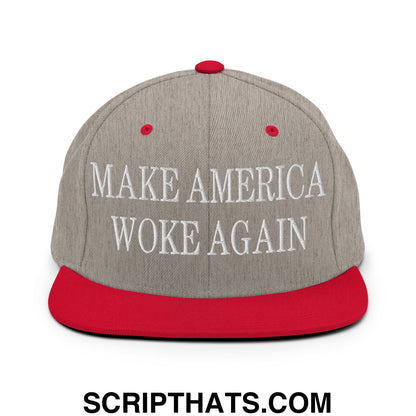 Gray snapback cap with red brim and button featuring white embroidered text make america woke again