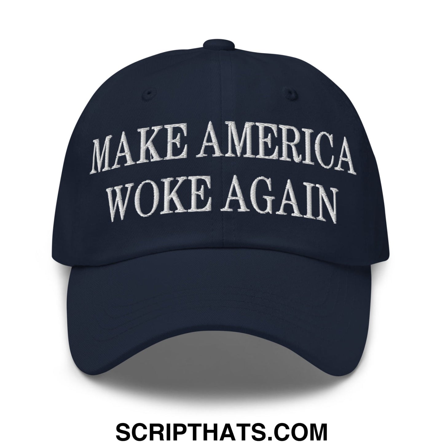 Navy blue unstructured dad hat with white embroidered text make america woke again in a casual style