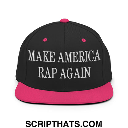 Black snapback hat with vibrant pink brim and button featuring white embroidered make america rap again text