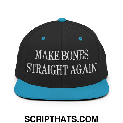 Black snapback cap with teal brim and button featuring white embroidered make bones straight again text