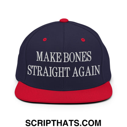 Navy blue snapback hat with red brim and white embroidered make bones straight again text flat bill brim design