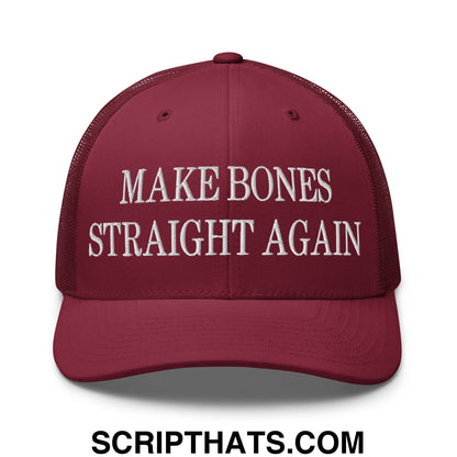 Maroon embroidered mesh trucker hat with white text saying make bones straight again on the front panel