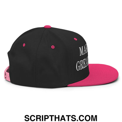 Black and pink snapback hat with white embroidered make america great again text on the side flat bill brim