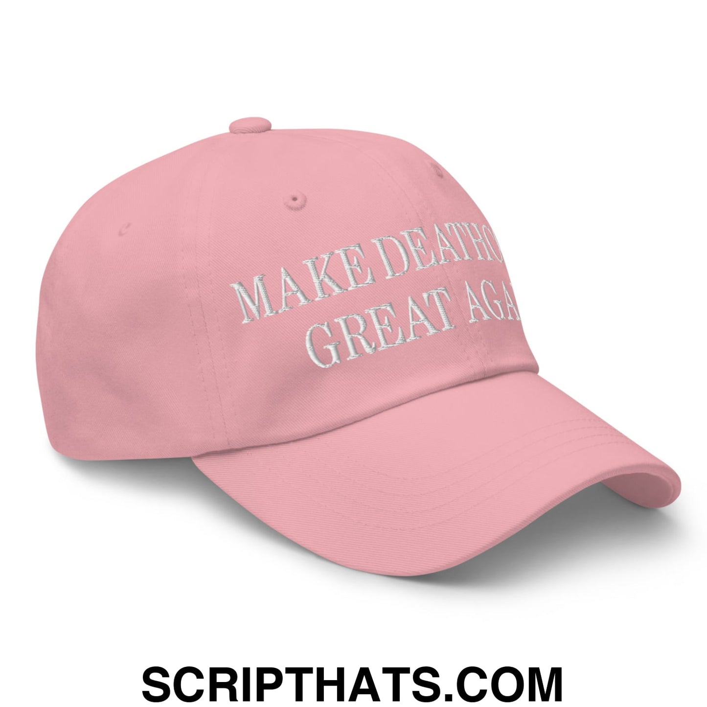 A soft pink unstructured dad hat with white embroidered make deathcore great again text on the front