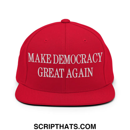 Red snapback cap with white embroidered make democracy great again text and flat bill brim design