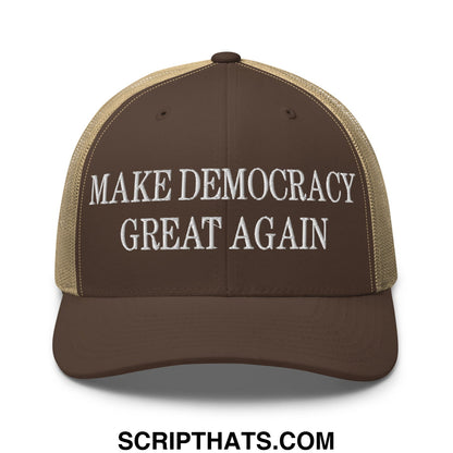 Brown and tan mesh trucker hat with white embroidered make democracy great again text on front panel
