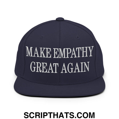 Navy blue snapback hat with white embroidered make empathy great again text and flat bill brim design