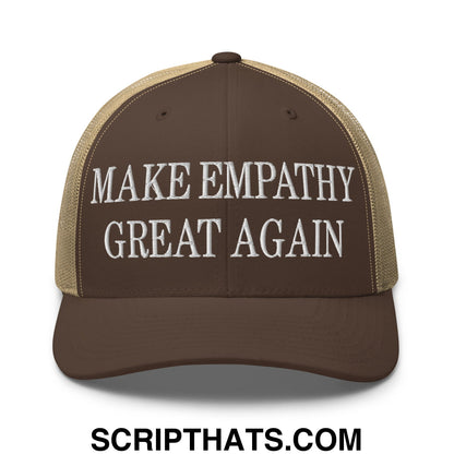 Brown and tan mesh trucker hat with white embroidered text reading make empathy great again