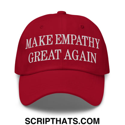 Red unstructured dad hat with white embroidered make empathy great again text for casual wear