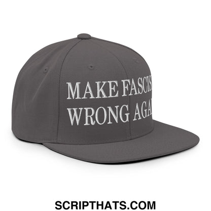 Dark gray snapback hat with white embroidered make fascism wrong again text and flat bill brim design