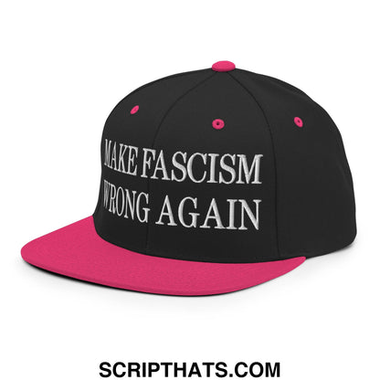 Black snapback cap with vibrant pink brim and button featuring white embroidered text make fascism wrong again