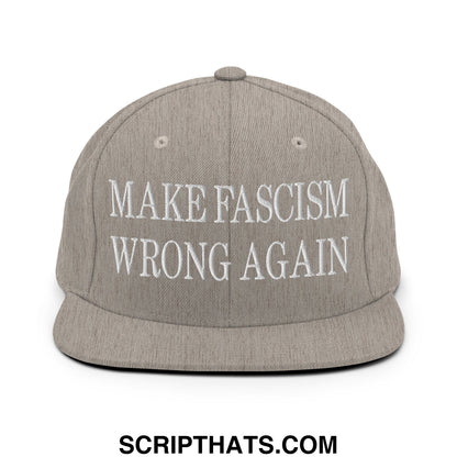 Gray snapback hat with white embroidered make fascism wrong again text and flat bill brim design