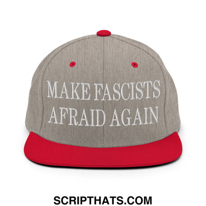 Gray and red snapback hat with white embroidered make fascists afraid again text on flat bill brim