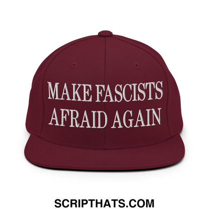 Maroon snapback cap with white embroidered text make fascists afraid again flat bill brim design