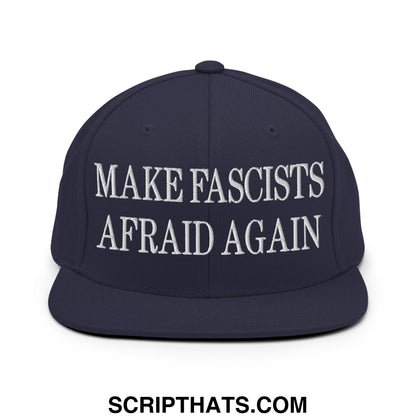 Navy blue snapback cap with white embroidered make fascists afraid again text and flat bill brim design