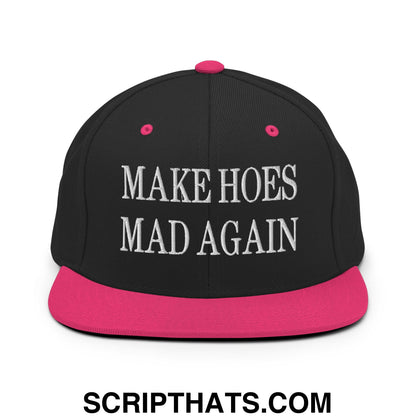 Black snapback cap with vibrant pink brim and button featuring white embroidered make hoes mad again text