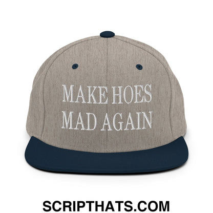 Gray and navy blue snapback hat with white embroidered make hoes mad again text and a flat bill brim design