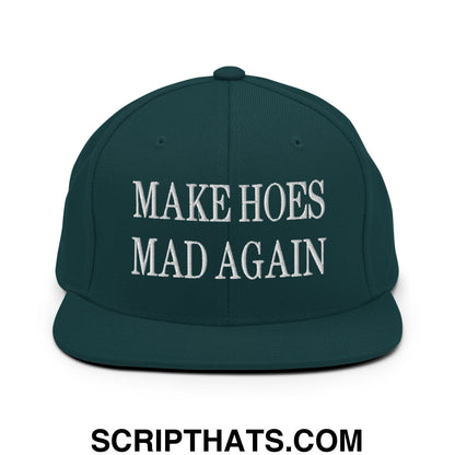 Dark green snapback hat with white embroidered make hoes mad again text and flat bill brim design