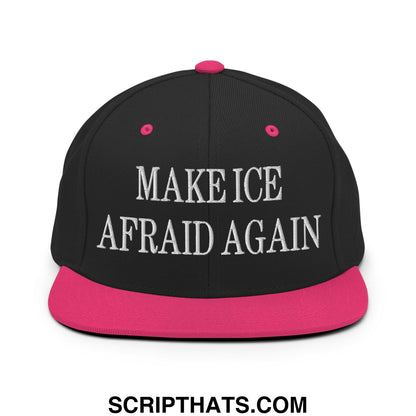 Black snapback cap with vibrant pink flat bill and white embroidered text make ice afraid again on front