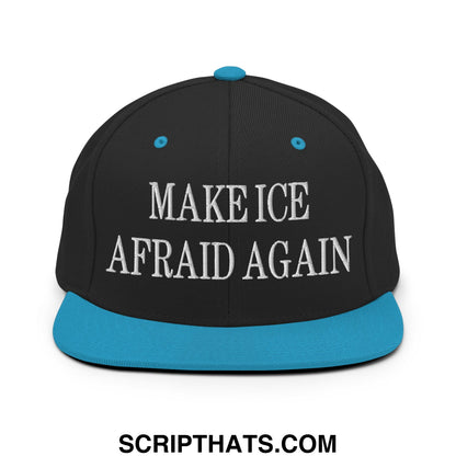 Black snapback cap with teal brim and button featuring white embroidered make ice afraid again text