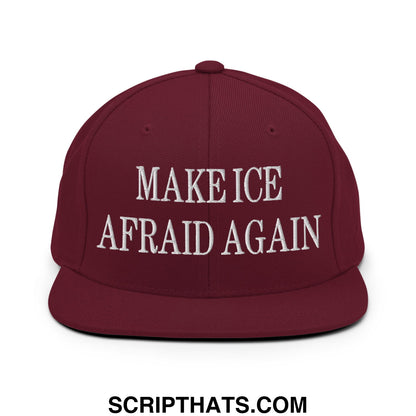 Maroon snapback hat with white embroidered make ice afraid again text and flat bill brim design
