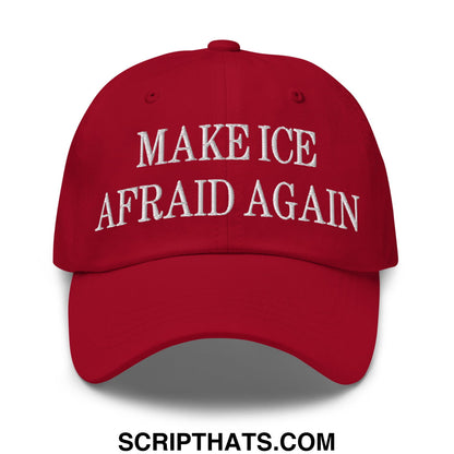 Red embroidered make ice afraid again unstructured dad hat featuring white text in a baseball cap style