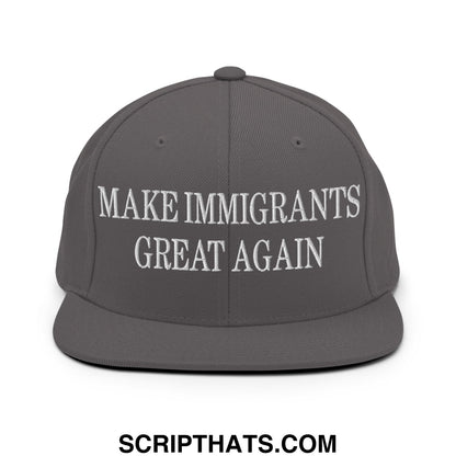 Gray snapback hat with white embroidered text reading make immigrants great again and a flat bill brim