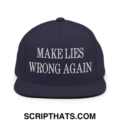 Navy blue snapback hat with white embroidered text make lies wrong again and flat bill brim design