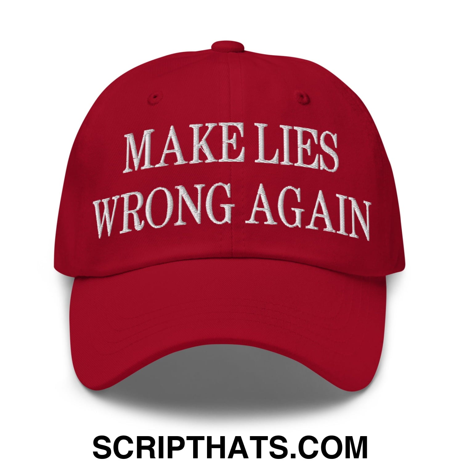 Red unstructured dad hat with white embroidered text make lies wrong again on the front panel