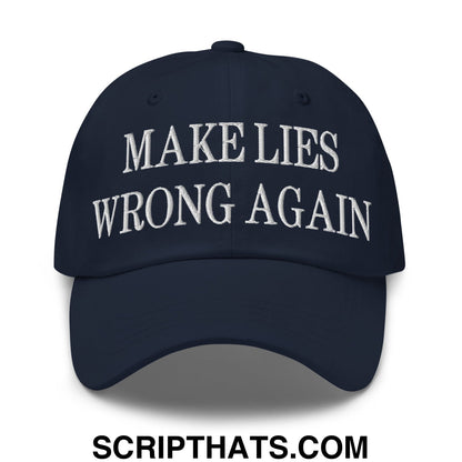 Navy blue embroidered unstructured dad hat with white text reading make lies wrong again for casual wear