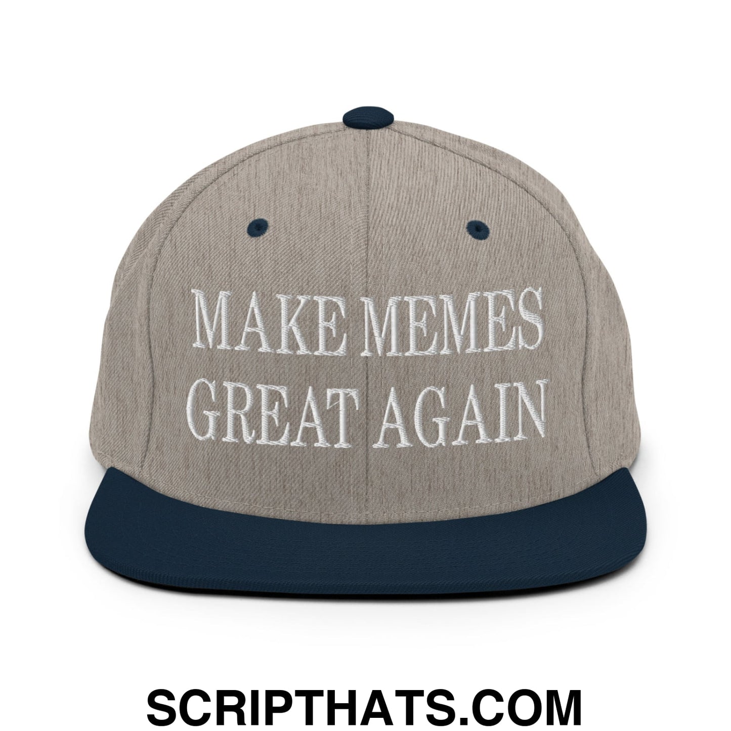 A gray and navy blue snapback hat with white embroidered make memes great again text and a flat bill brim
