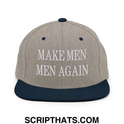 A gray snapback hat with navy blue brim and white embroidered text make men men again flat bill brim snapback hat