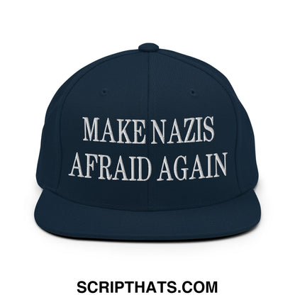 Navy blue snapback cap with white embroidered make nazis afraid again text and flat bill brim design
