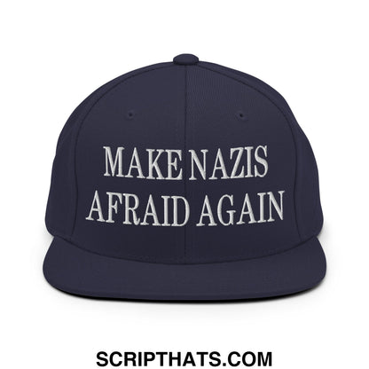 Navy blue snapback hat with white embroidered make nazis afraid again text and flat bill brim design