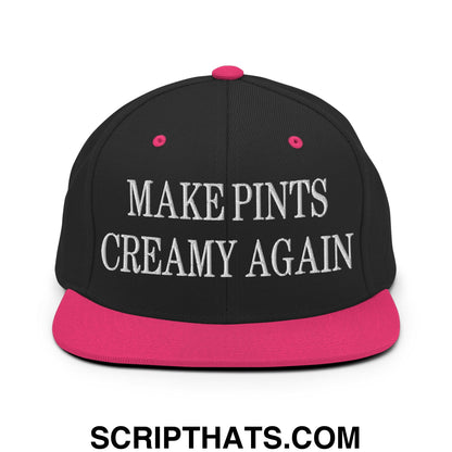 Black snapback cap with vibrant pink brim and button featuring white embroidered text make pints creamy again