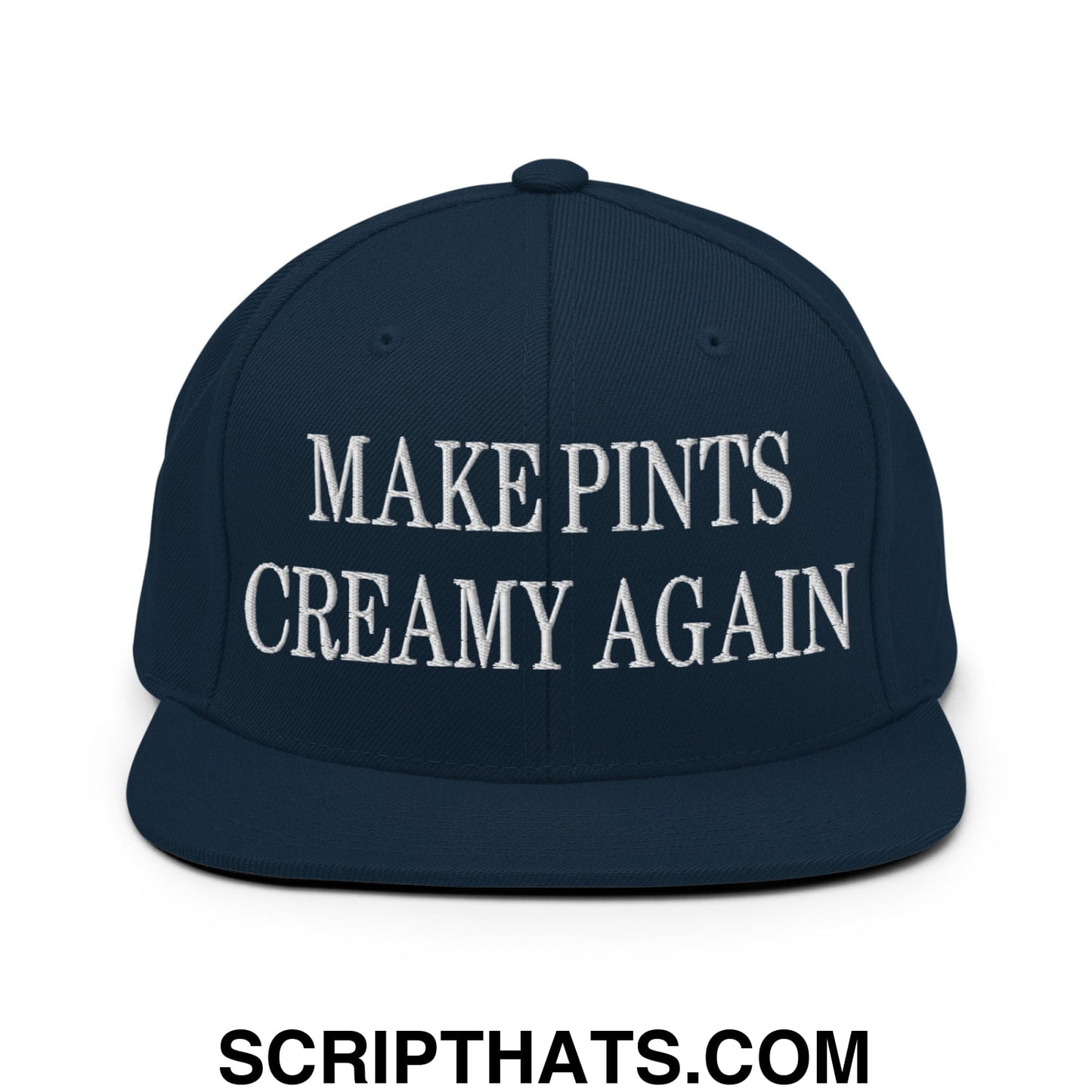 Navy blue snapback cap with white embroidered text make pints creamy again and flat bill brim design