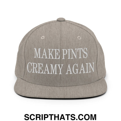 Gray snapback hat with white embroidered text reading make pints creamy again on a flat bill brim design