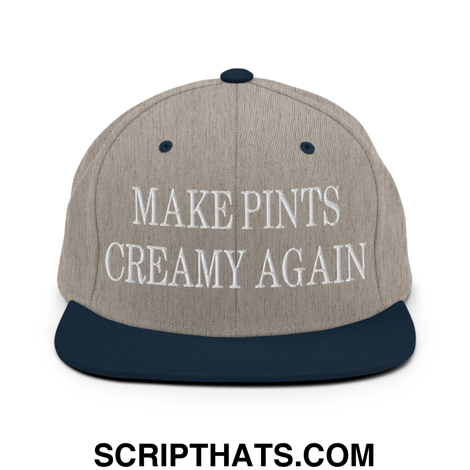 A gray and navy blue snapback hat with white embroidered make pints creamy again text and a flat bill brim