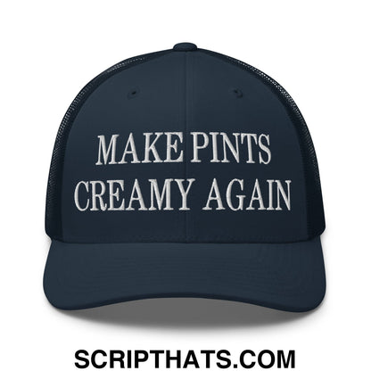 Dark navy mesh trucker hat with white embroidered text make pints creamy again across the front panel