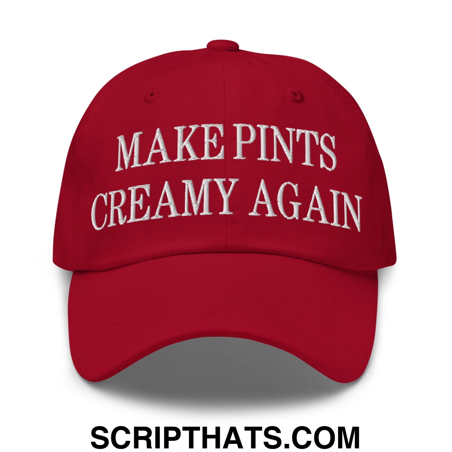 Red unstructured dad hat with white embroidered make pints creamy again text perfect for casual wear