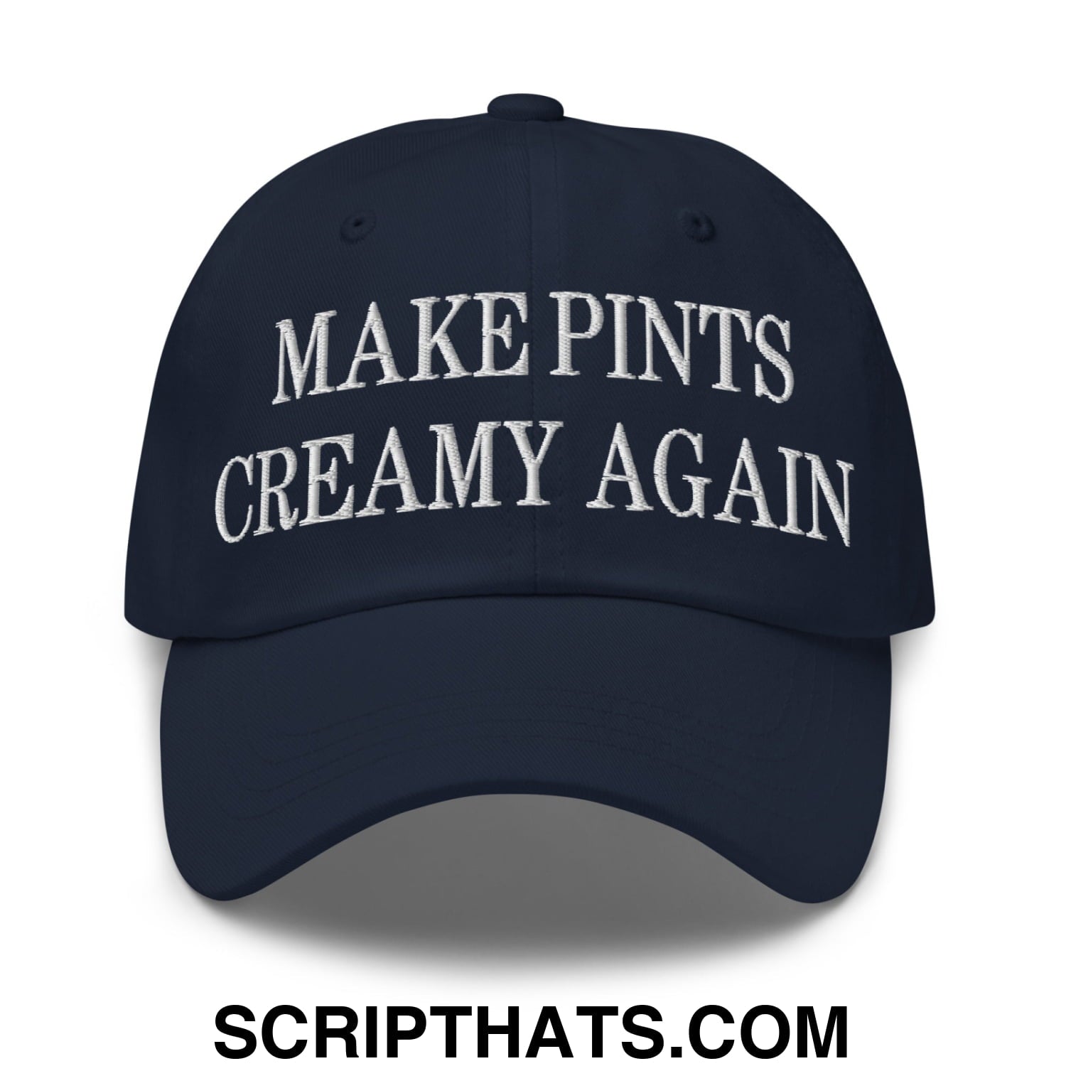 A navy blue unstructured dad hat with white embroidered make pints creamy again text for casual wear