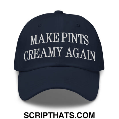 A navy blue unstructured dad hat with white embroidered make pints creamy again text for casual wear