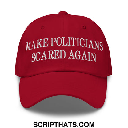 A red embroidered unstructured dad hat with white text make politicians scared again displayed front side