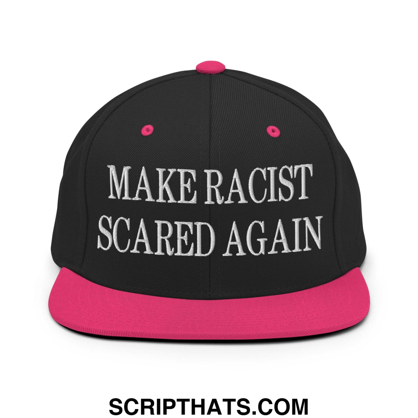 Black snapback hat with vibrant pink flat bill and button featuring white embroidered make racist scared again text