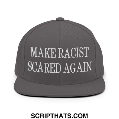 A dark gray snapback hat with white embroidered text reading make racist scared again on the front panel