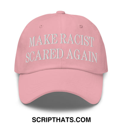 A soft pink embroidered unstructured dad hat with white make racist scared again text on the front