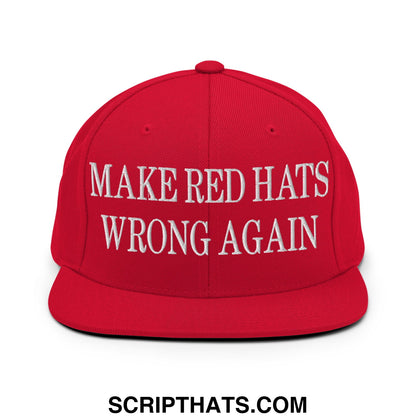 A vibrant red snapback hat with white embroidered make red hats wrong again text on the front flat bill brim