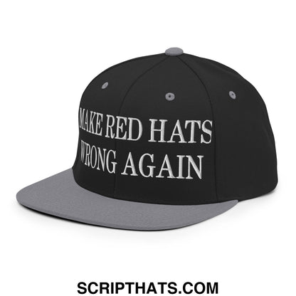 Black and gray snapback hat with white embroidered make red hats wrong again text and flat bill brim design