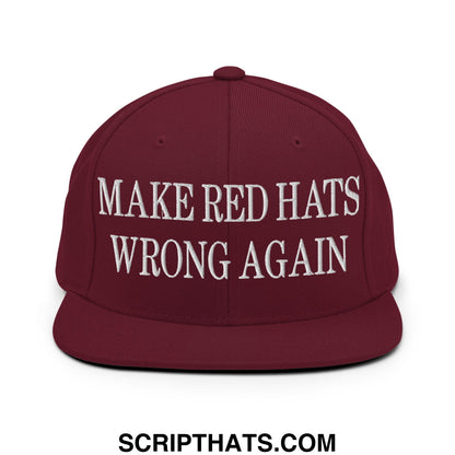 Maroon snapback cap with white embroidered make red hats wrong again text and flat bill brim design